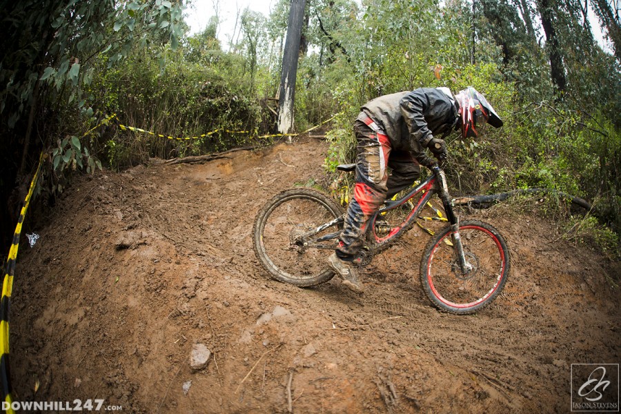 Jackson Davis puts the power down mid-powerslide on the slippery berm.